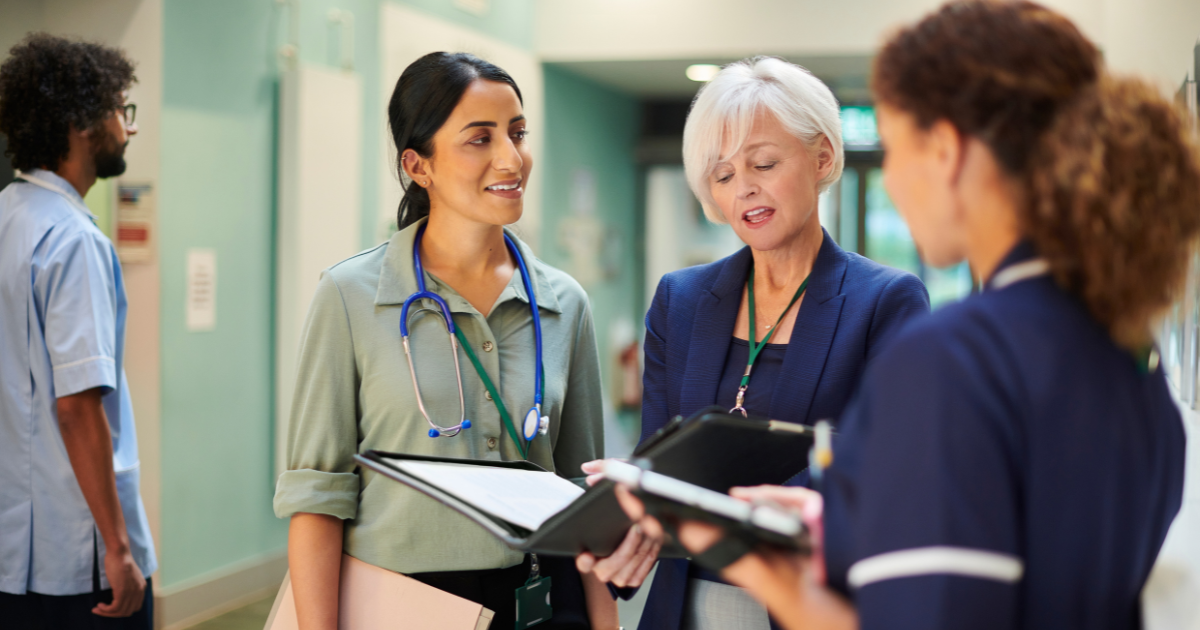 UK nurses discussing copper vs silver wound dressings and cost comparison decisions in NHS wound care